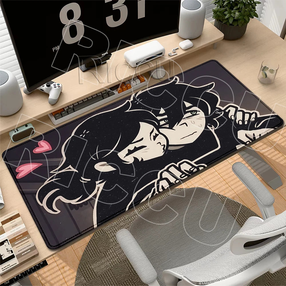 A gaming mouse pad featuring a stylized illustration of Andy and Leyley from The Coffin of Andy and Leyley.