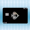A black card featuring a holographic laser design and a square chip.