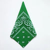 A green cotton bandana square scarf featuring an intricate white paisley print.