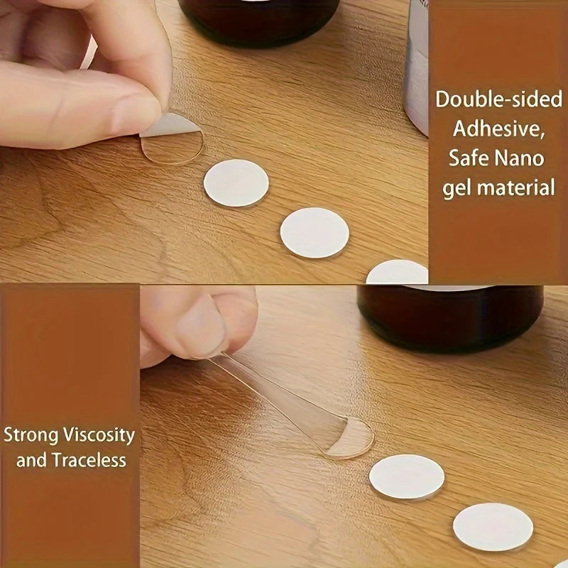 Close-up of double-sided adhesive nano gel material being applied to a wooden surface.