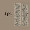 A vertical rectangular image showing a decorative silver stamping lace tape design on a beige background.