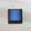 A dark blue replacement keycap for a Dell Alienware AW510K keyboard, shown against a light background.