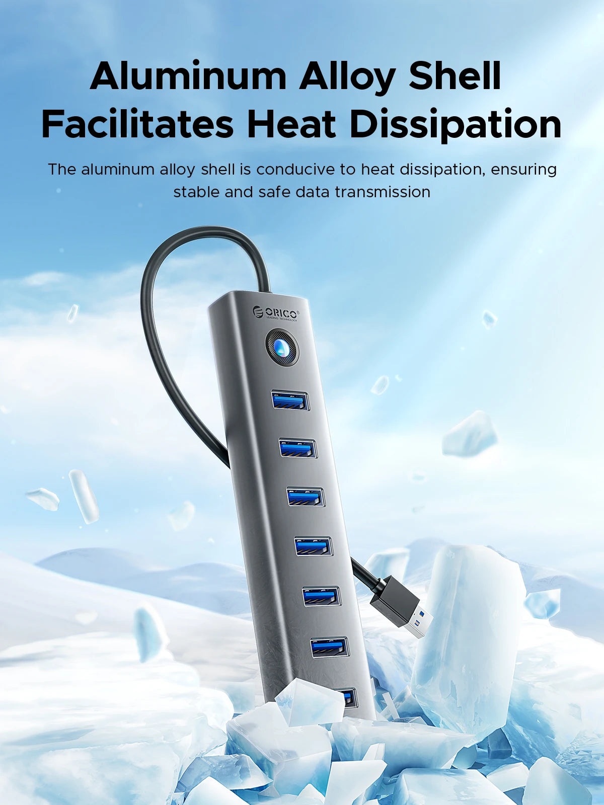 A silver aluminum alloy shell 7-port USB 3.0 hub is shown amidst ice and snow.