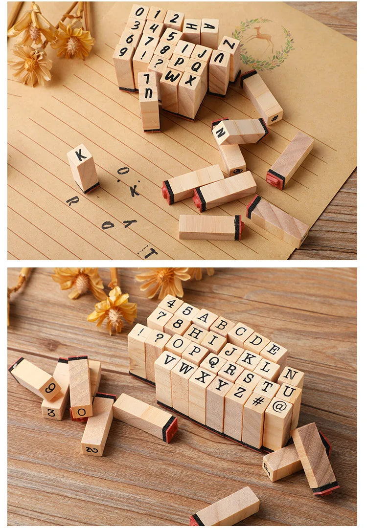A collection of vintage wooden stamp seals and alphabet blocks arranged on a light brown paper background.