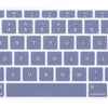 A close-up view of a light purple silicone keyboard cover designed for MacBook Air and Pro.