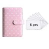 A pink reusable PU leather binder with white polka dots and a clear plastic sleeve containing six pages.