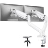 A white ergonomic dual monitor mount with full motion adjustment mechanism and a small stand.