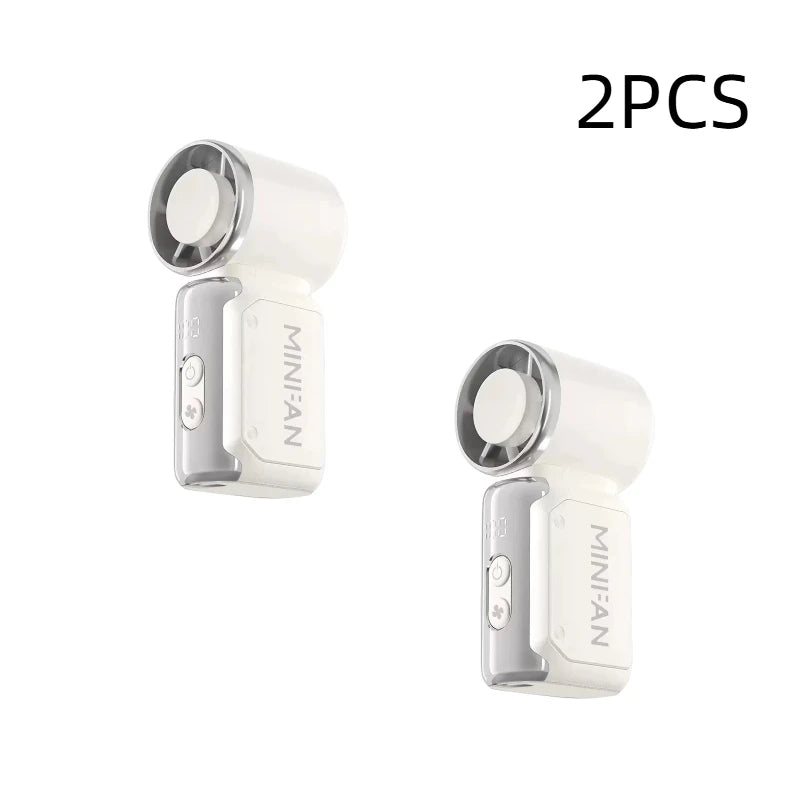 Two white portable USB rechargeable mini fans shown side by side.