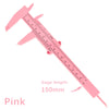 Pink precision eyebrow measuring caliper showing a 150mm scale for permanent makeup application.