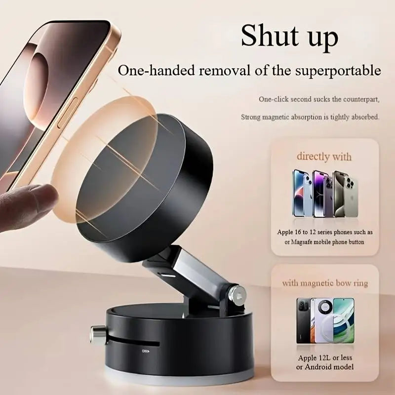 A hand is demonstrating the one-handed removal of a foldable magnetic phone holder for car or desk use.