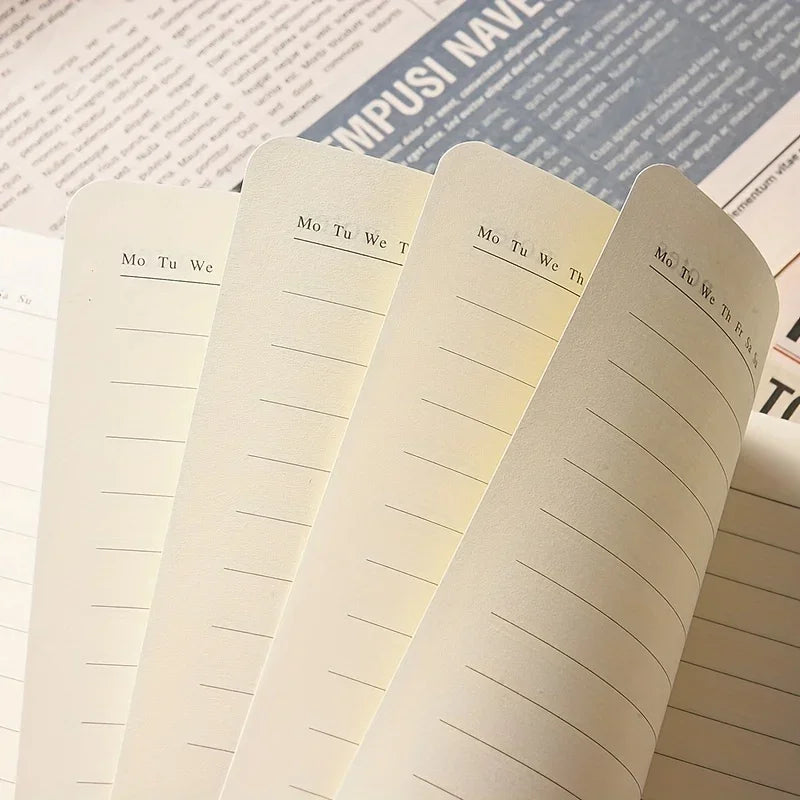 A close-up of a luxury PU leather notebook set with lined pages showing handwritten text.