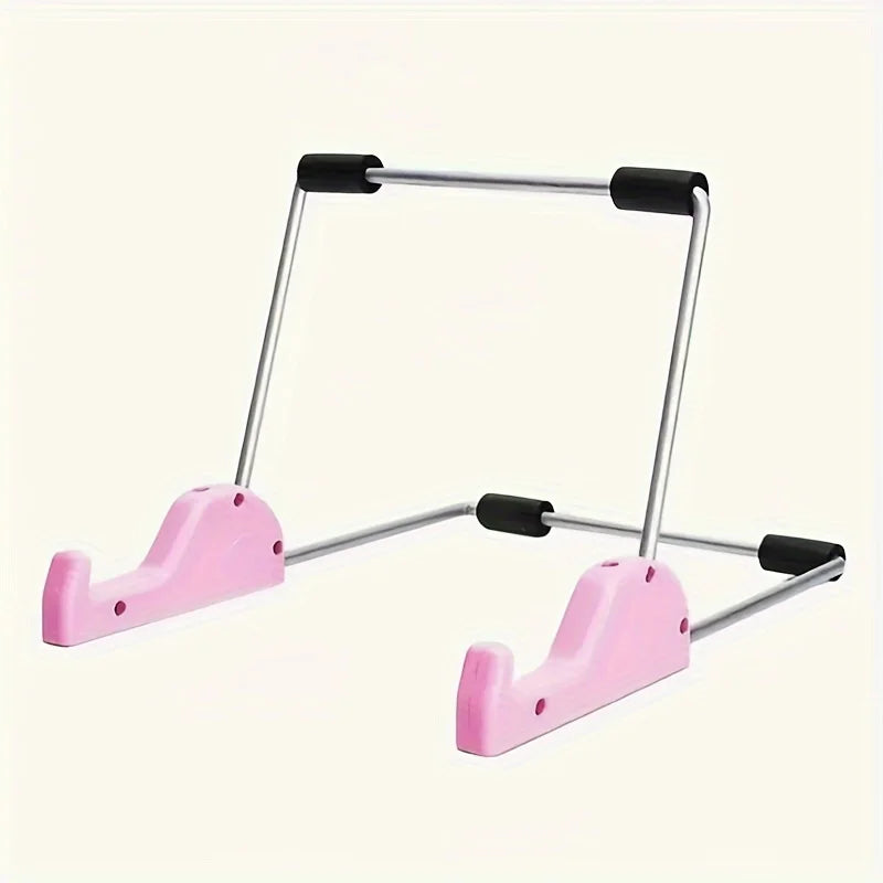 A pink foldable aluminum stand for tablets and laptops with black grips.