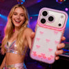 A woman holds an LED bowknot glow case for an iPhone, featuring a light show design.