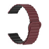 A close-up view of a maroon adjustable magnetic loop watch band.