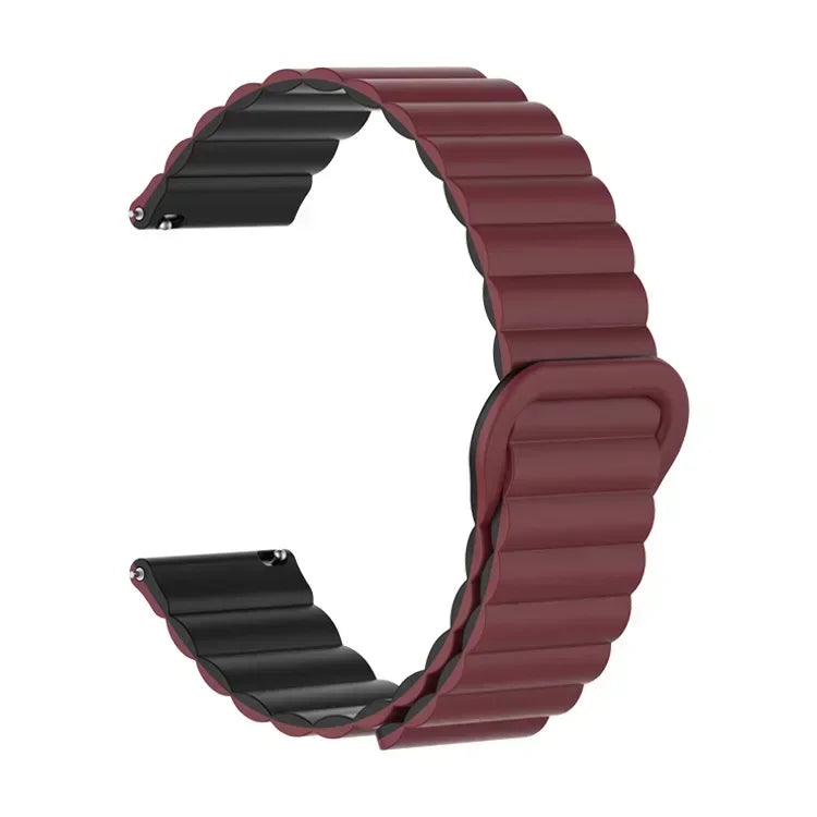 A close-up view of a maroon adjustable magnetic loop watch band.