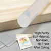 A clear plastic tube of EVA material next to a hand-painted greeting card and a piece of clear plastic sheet.