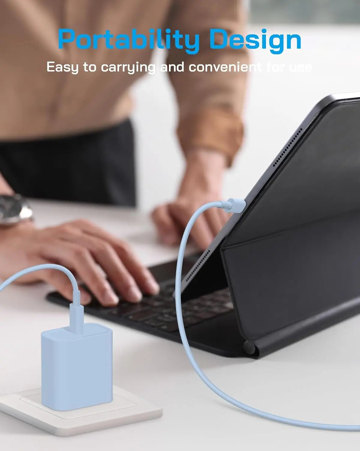 A close-up of a portable USB-C power adapter being used to charge a laptop.