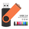 A black metal pendrive with an orange body and various colored metal connectors shown next to the product.