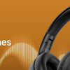 A close-up of black Acer OHR205 Bluetooth headphones against an orange background.