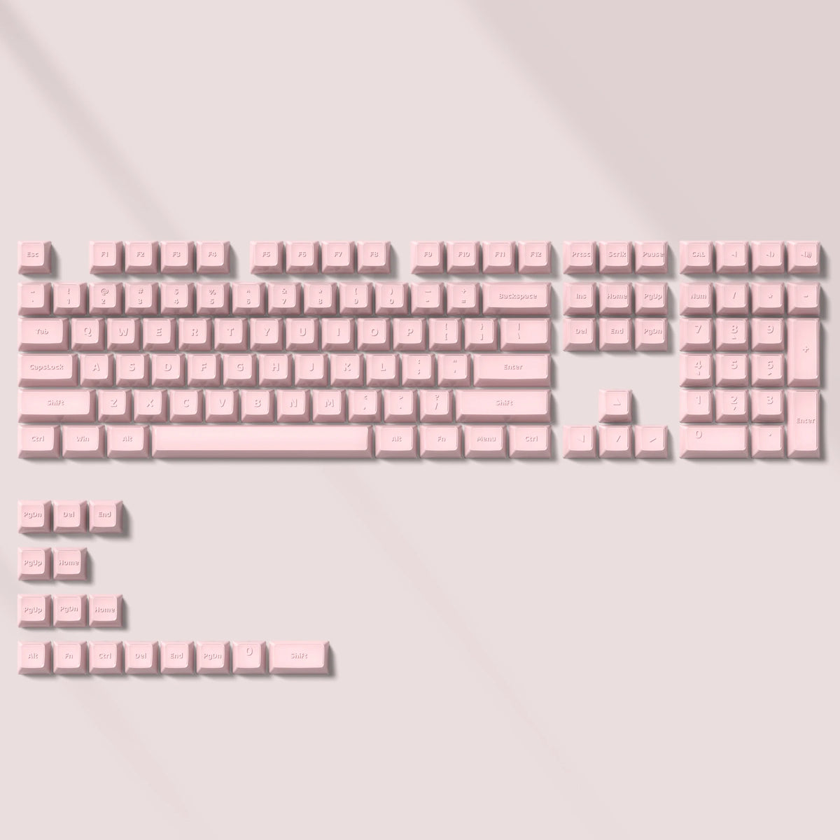A close-up view of custom printed pink jelly keycaps for a mechanical keyboard.