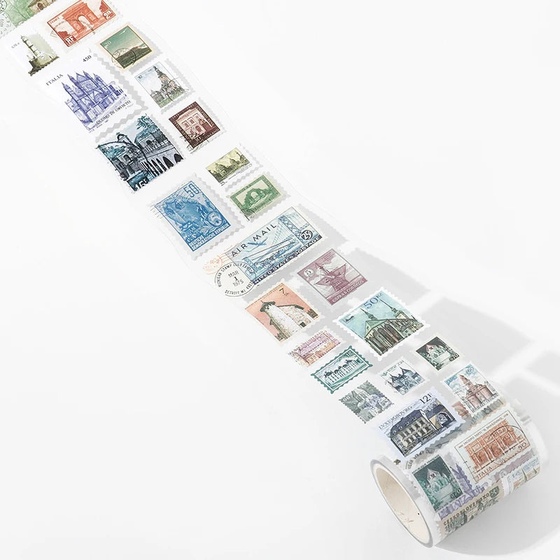 A long strip of vintage postage stamps used as tape stickers for scrapbooking