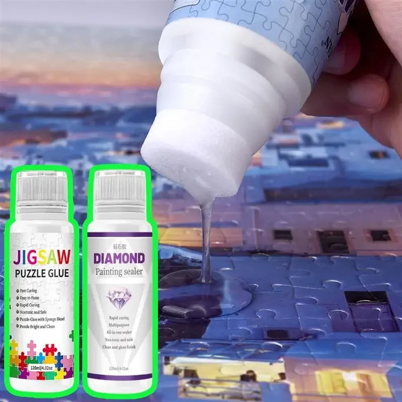 Eine Flasche Puzzelkleber tropft auf eine blaue Diamantmal-Puzzeloberfläche.