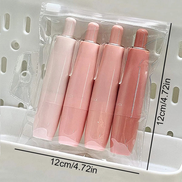 A set of four pink heavy duty double-sided adhesive tape tubes packaged in clear plastic.