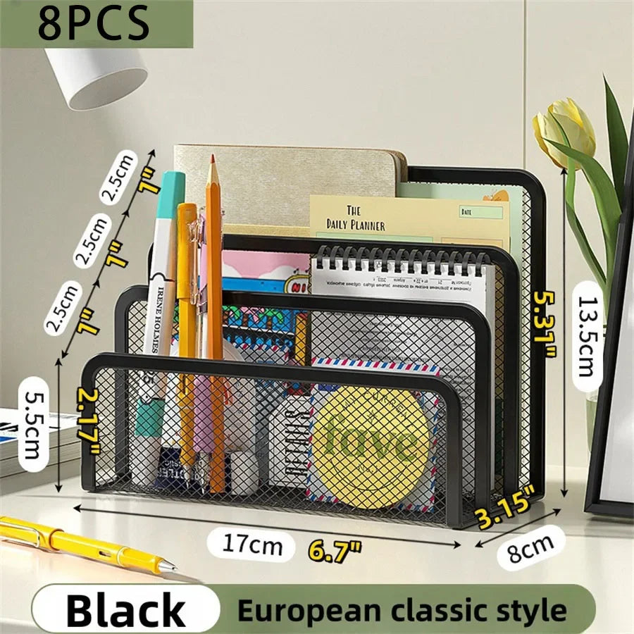 Black metal mesh desk file organizer holding various stationery and planner items
