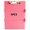 A pink A4 foldable medical clipboard with a silver clasp and the text 5PCS visible on the surface.
