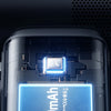 Close-up of a handheld device showing a 9000mAh battery display and technical components.