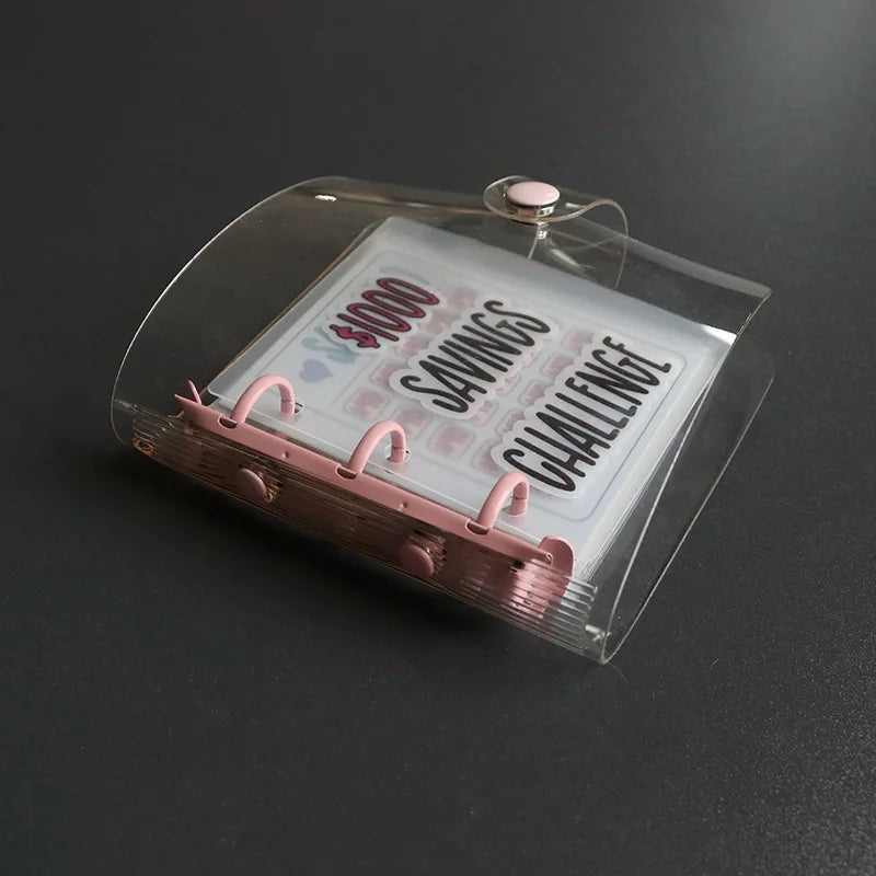 A clear binder for a premium savings challenge with pink and white accents.