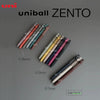 A collection of UniBall ZENTO precision gel pens in various colors and sizes, showing different ink thicknesses.