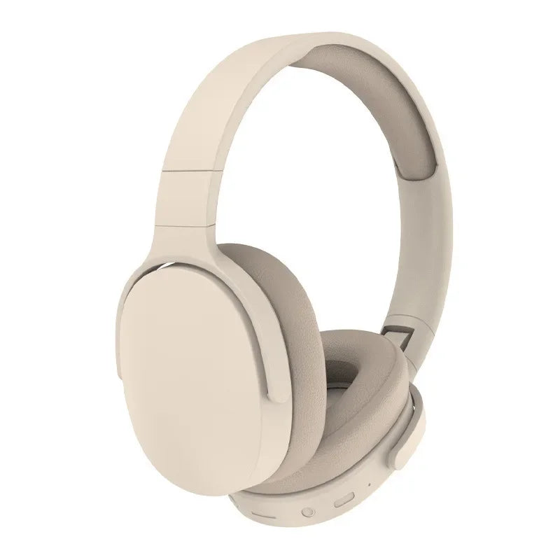 Casque de jeu Bluetooth beige avec grande écouteure et design supra-auriculaire.