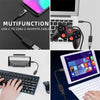 An adapter cable connecting a USB-C port to a USB-A port, shown next to a laptop and a gaming controller.