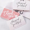 Pink and white thank you cards with handwritten text saying beyond grateful and thank you so much