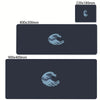 A dark blue mouse pad featuring a white illustration of The Great Wave of Kanagawa.
