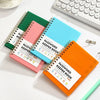 A set of colorful A6 password keeper notebooks with alphabetical tabs arranged on a white surface.