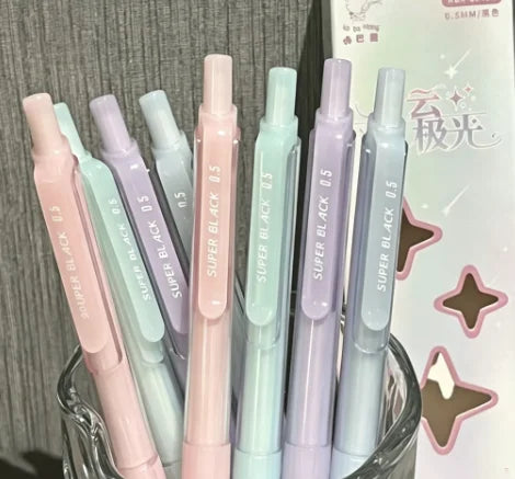 A pack of four pastel gradient gel pens in various shades of pink, purple, and mint green.