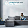 A person is sitting on a gray sofa using a 6ft lightning cable for charging.