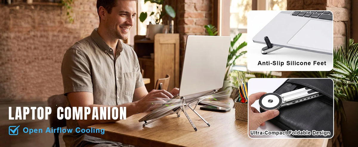 A man is using a laptop mounted on an anti-slip silicone feet and foldable design for support.