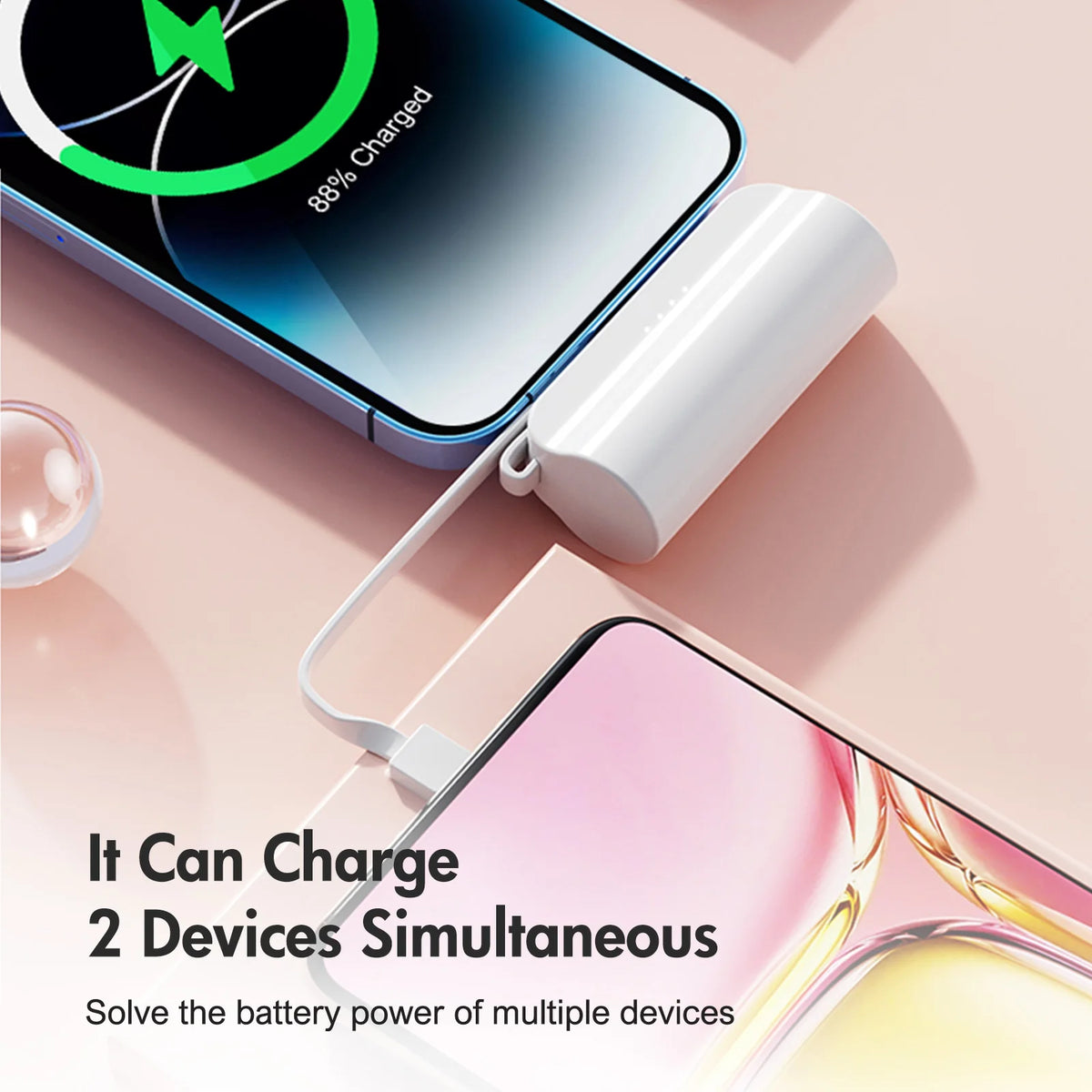 A white power bank is shown charging a smartphone, with text indicating 88% charge and the ability to charge two devices simu