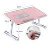 A pink portable adjustable laptop desk stand with a mesh tray and adjustable arms.