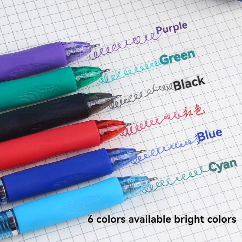 A set of six bright colored retractable gel pens, including purple, green, black, red, blue, and cyan, are lined up on a grid