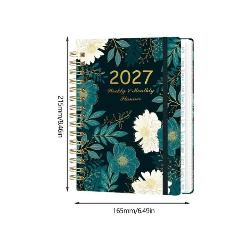 A dark teal spiral bound planner for 2027 with weekly and monthly planning sections.
