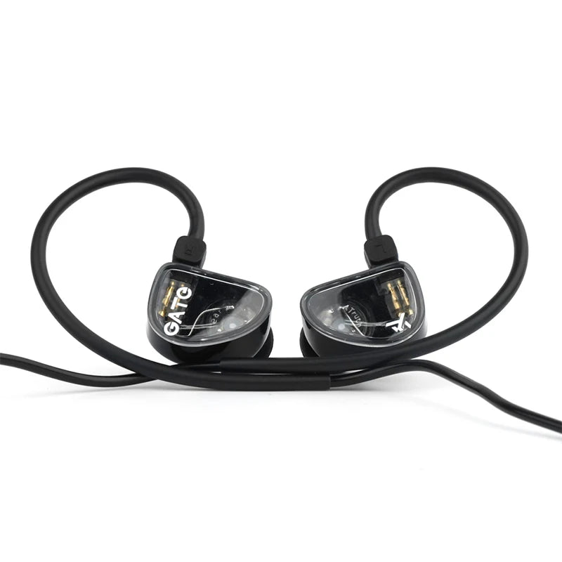 A pair of black wired in-ear headphones with clear silicone tips and a black cable.
