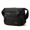 Black women's multifunctional crossbody bag with a padded strap and zippered compartments.