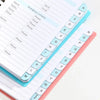 A6 password keeper notebook with alphabetical tabs showing letters A through Z
