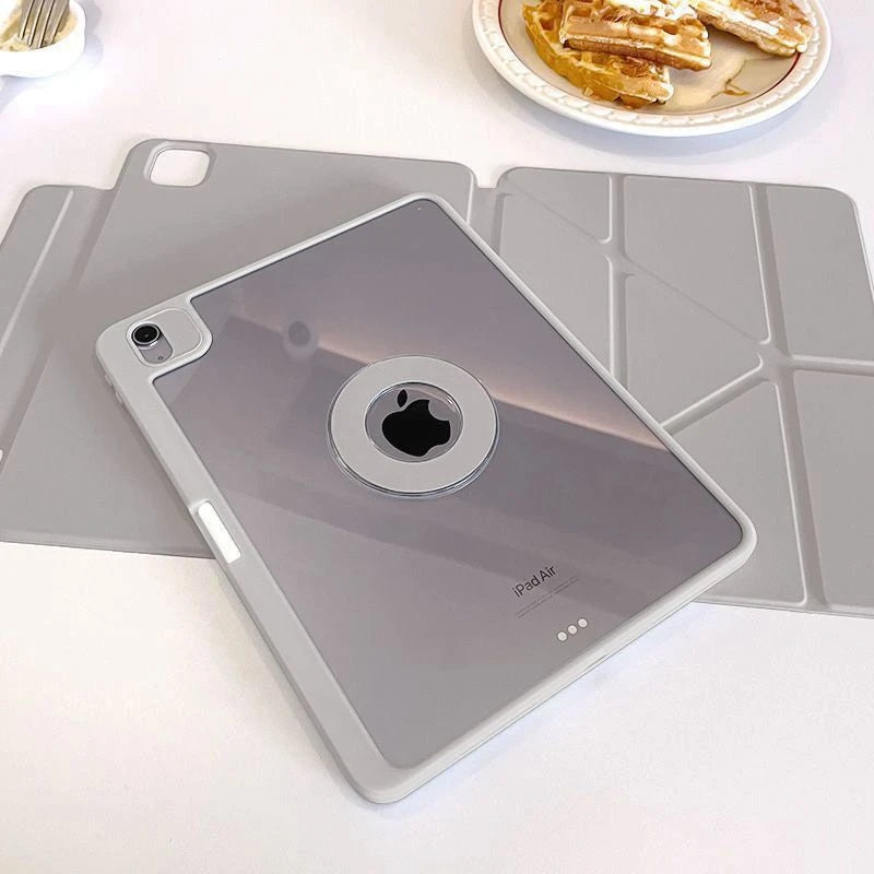 A silver iPad Air is shown resting on a matching protective case and a silicone stand on a white surface.