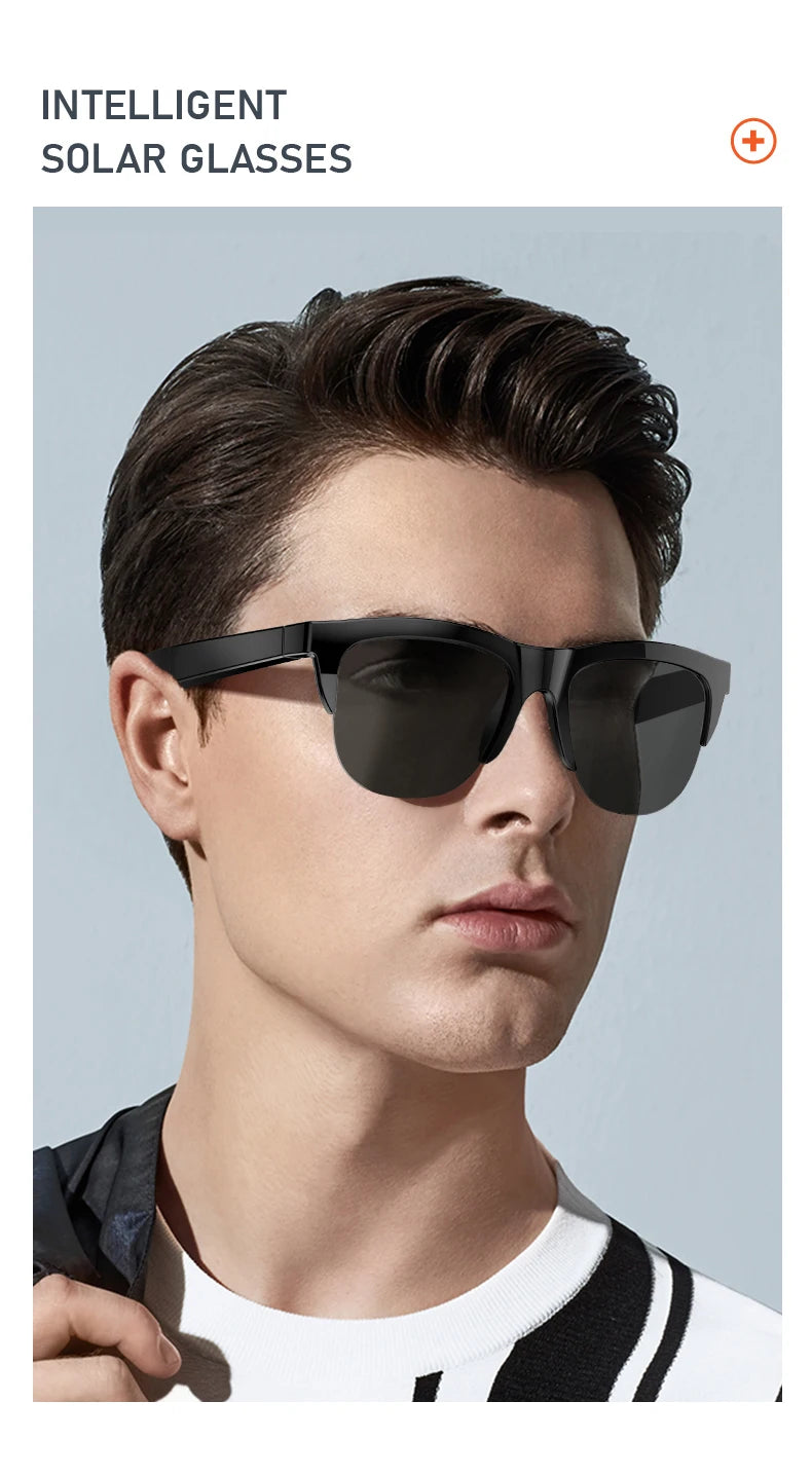 A male model wearing black intelligent solar glasses with dark hair and a casual shirt.