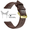 A brown genuine leather watch band featuring quick release spring bars and a slide lever for easy strap attachment.